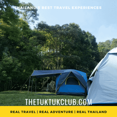 Two tents set up in a forest clearing in the mountains of Northern Thailand