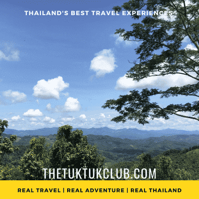 Views over the mountains with blue skies and fluffy clouds in Thailand