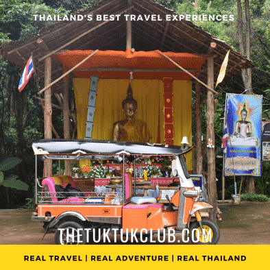 A Tuk Tuk in front of a golden Buddha image in a remote forest Temple on a Tuk Tuk Adventure