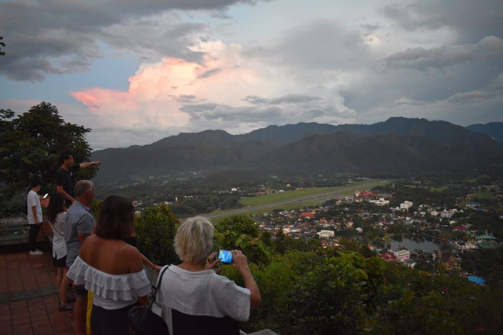 Travellers enjoyiing the views across the mountains of Mae Hong Son
