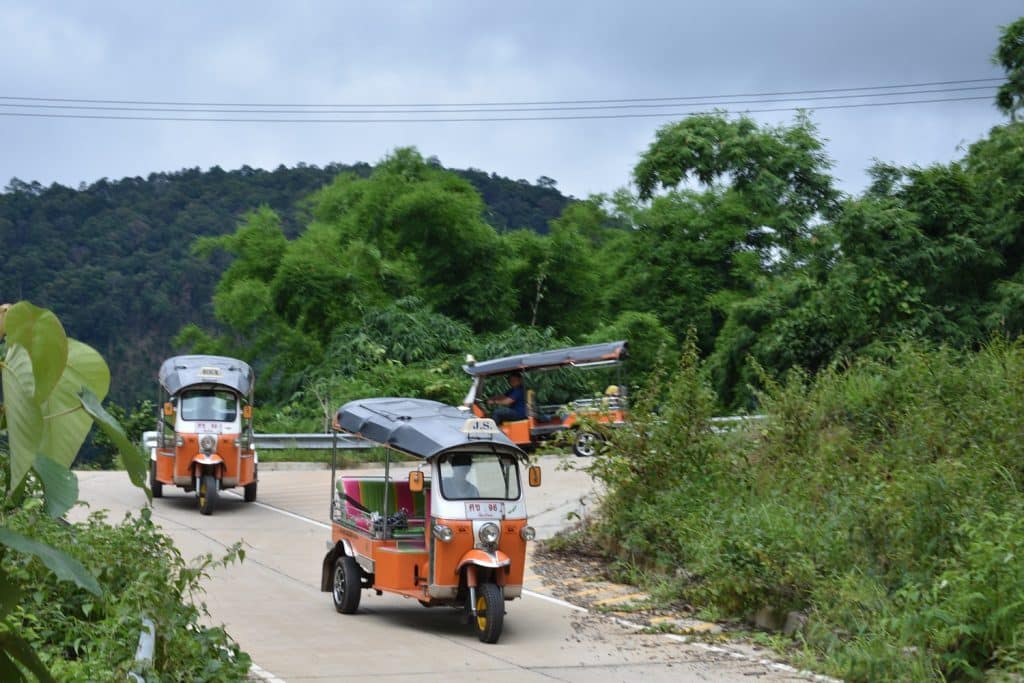 THINGS TO DO IN CHIANG MAI 5 Three Tuk Tuks descending a steep hairpin bend